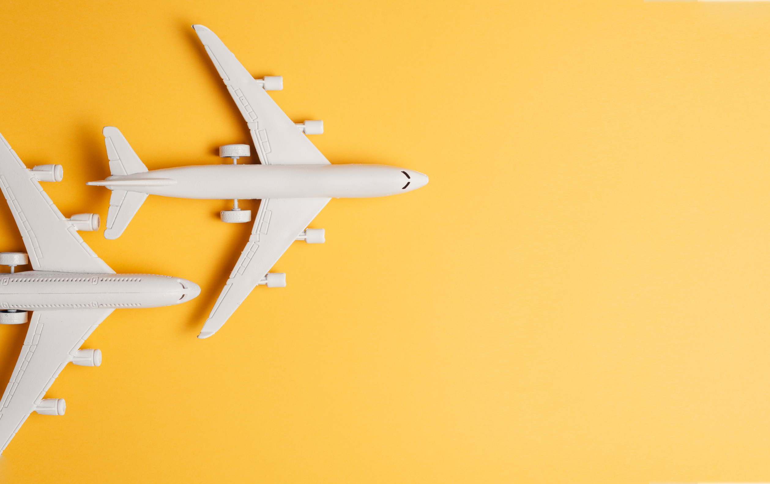 Two Jet Planes on Orange Background